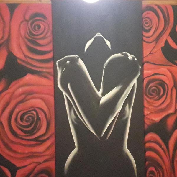 female figure among the roses