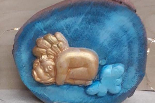 Αγγελάκι στα σύννεφα