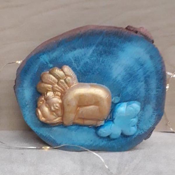 Αγγελάκι στα σύννεφα